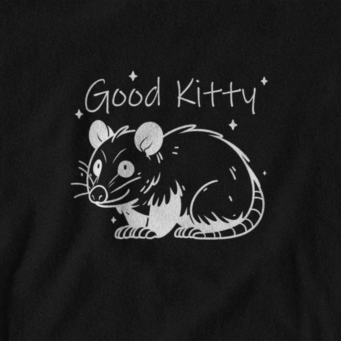 Black t-shirt with a white possum illustration and 'Good Kitty' text on a black background
