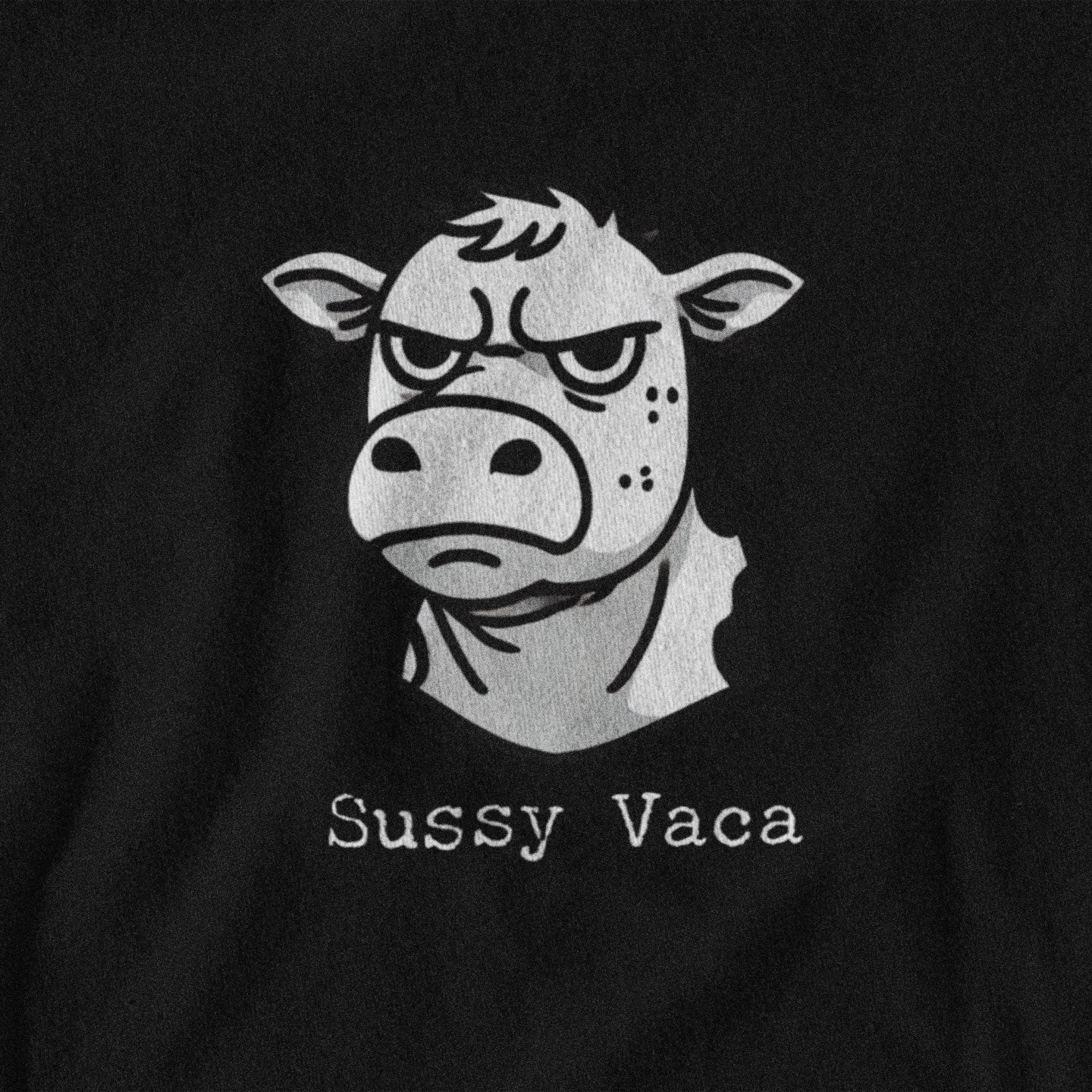 Black t-shirt with a graphic of an angry cow and 'Sussy Vaca' text on a black background