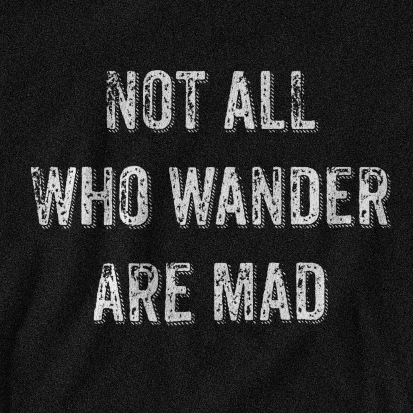 Black t-shirt with white text 'NOT ALL WHO WANDER ARE MAD' on a black background