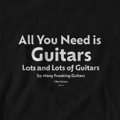 Black t-shirt with white text 'All You Need is Guitars Lots and Lots of Guitars So Many Freaking Guitars I Like Guitars' on a black background.