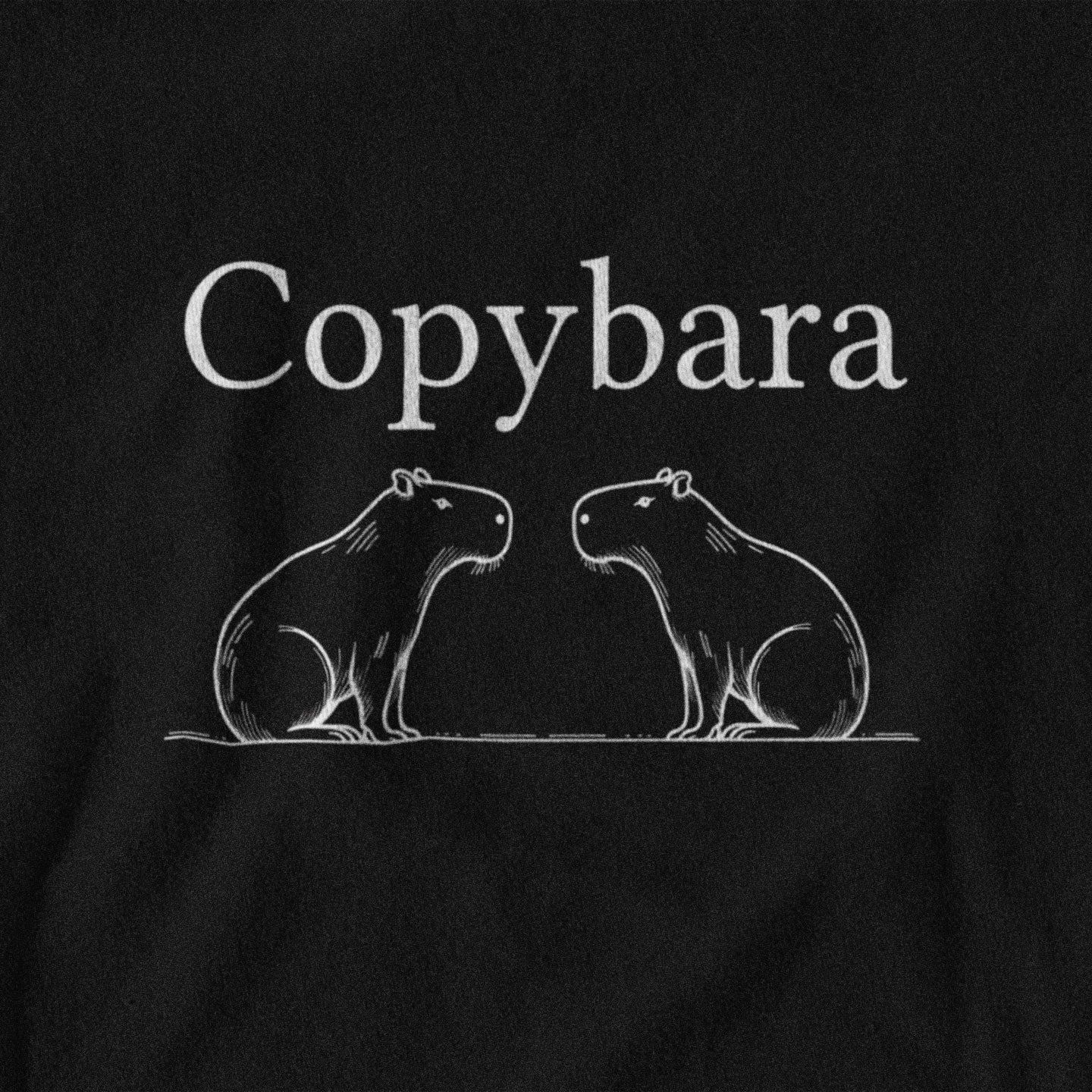 Black shirt with 'Copybara' text and capybara illustrations on a black background