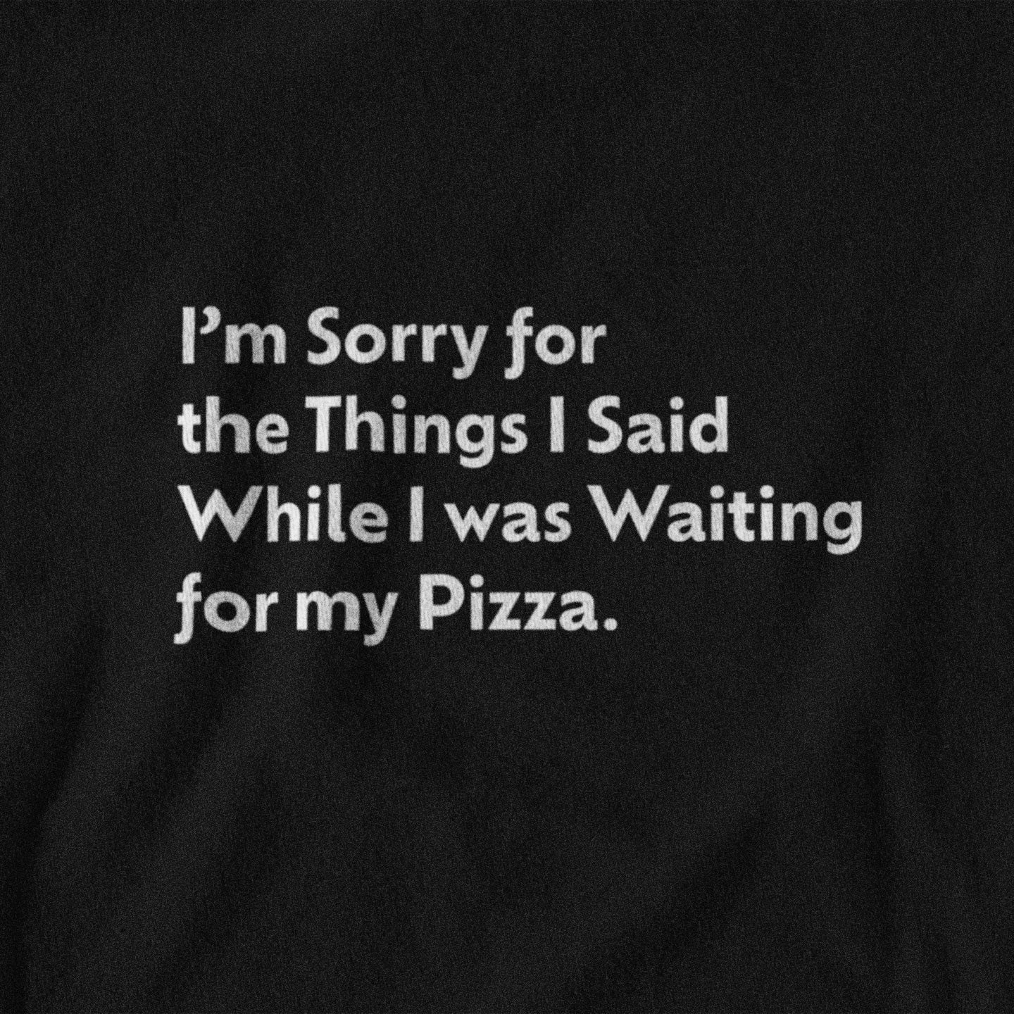 Black t-shirt with white text on a black background