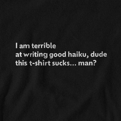 Black t-shirt with white text on a black background